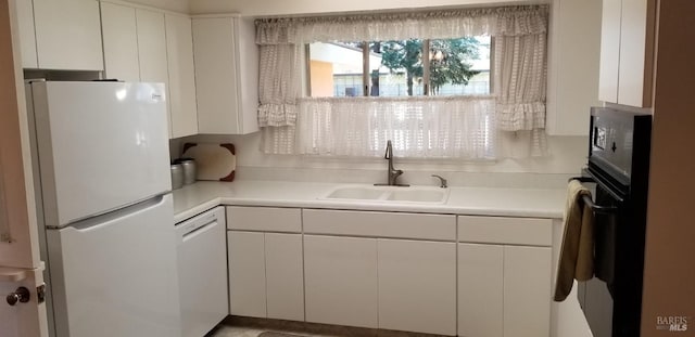 2324 W Park Ave, Napa, CA 94558 - kitchen with white appliances, a sink, white cabinetry, and light countertops