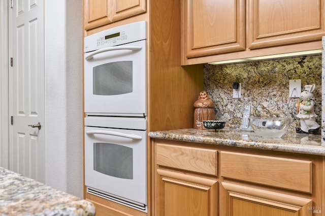 421 Redmont Ln, Rio Vista, CA 94571 - kitchen featuring double oven, decorative backsplash, and light stone countertops