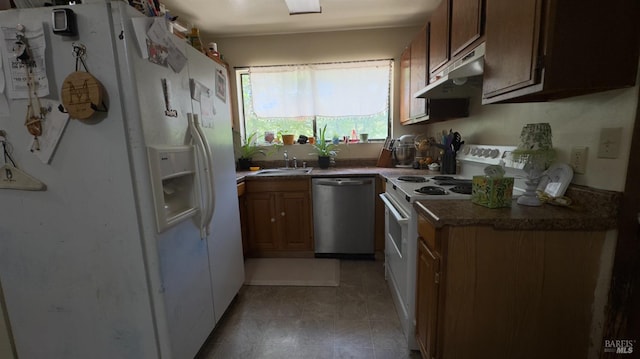 25248 Robinson Rd, Willits, CA 95490 - kitchen featuring white appliances, under cabinet range hood, a sink, brown cabinets, and dark countertops