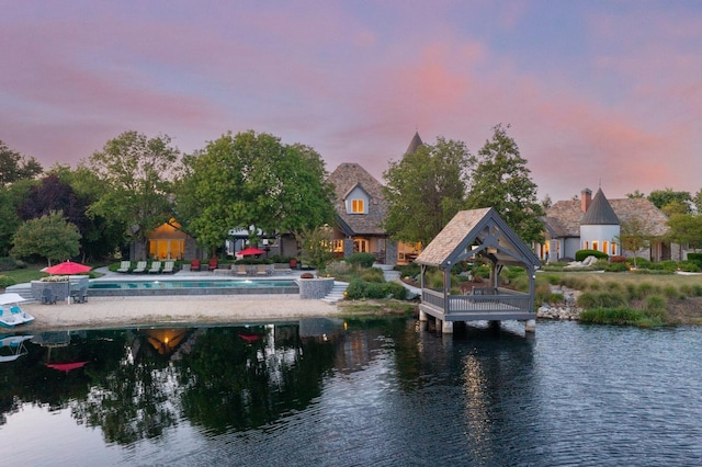 27681 Mace Blvd, Davis, CA 95618 - dock area featuring a gazebo, a water view, an outdoor pool, and a patio area