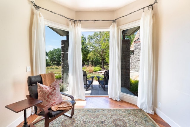 27681 Mace Blvd, Davis, CA 95618 - sitting room featuring wood finished floors and baseboards