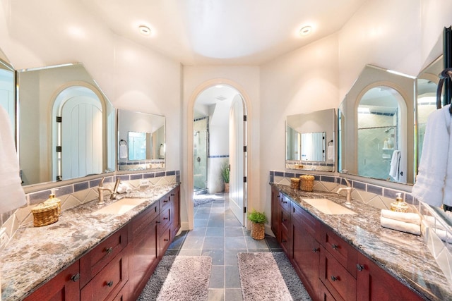 27681 Mace Blvd, Davis, CA 95618 - bathroom featuring decorative backsplash, two vanities, and a shower