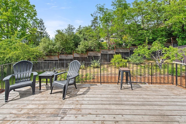 8940 Irving St, Graton, CA 95444 - wooden terrace featuring a fenced backyard and view of scattered trees