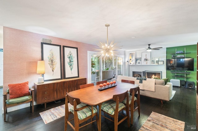 464 Azalea Way, Vacaville, CA 95688 - dining room featuring a warm lit fireplace, wood finished floors, ceiling fan, and a chandelier