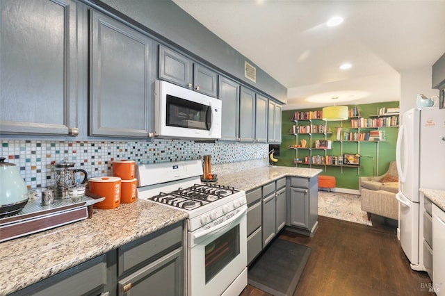 464 Azalea Way, Vacaville, CA 95688 - kitchen with white appliances, gray cabinetry, decorative backsplash, dark wood finished floors, and recessed lighting