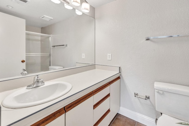 3183 Wayside Plz Unit 319, Walnut Creek, CA 94597 - full bathroom with toilet, a stall shower, vanity, baseboards, and tile patterned floors