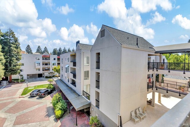 3183 Wayside Plz Unit 319, Walnut Creek, CA 94597 - view of apartment building / complex featuring uncovered parking