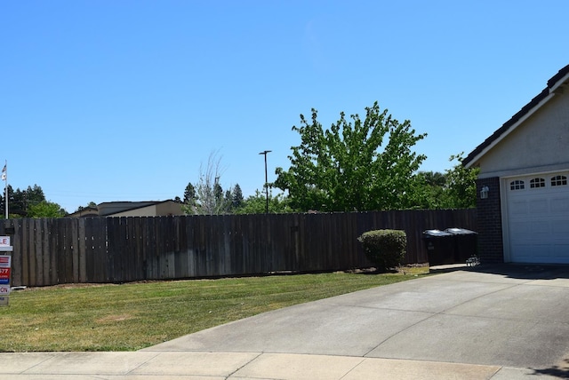 view of yard with a garage
