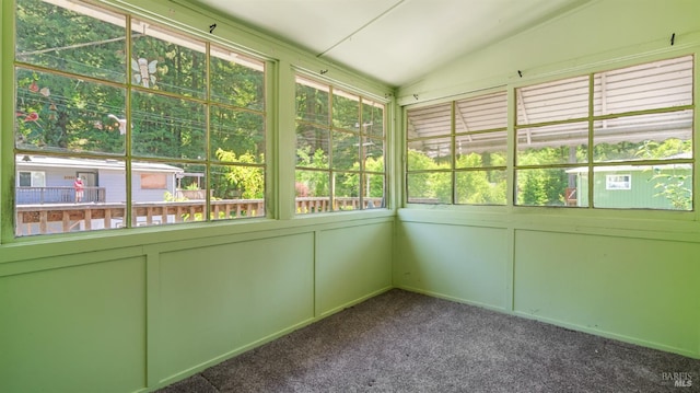 20226 Willow Rd, Monte Rio, CA 95462 - unfurnished sunroom featuring plenty of natural light, carpet, lofted ceiling, and a decorative wall