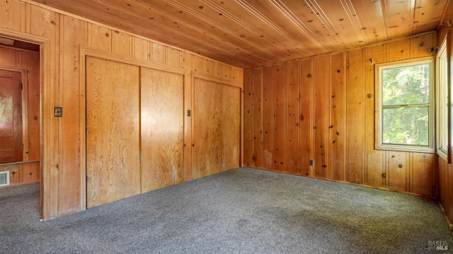 20226 Willow Rd, Monte Rio, CA 95462 - carpeted empty room with wood walls and wood ceiling
