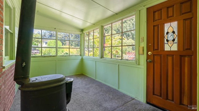 20226 Willow Rd, Monte Rio, CA 95462 - sunroom / solarium with lofted ceiling, carpet, plenty of natural light, and a decorative wall
