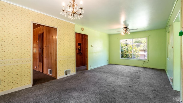 20226 Willow Rd, Monte Rio, CA 95462 - carpeted spare room featuring crown molding, a chandelier, ceiling fan, wallpapered walls, and baseboards