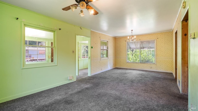 20226 Willow Rd, Monte Rio, CA 95462 - empty room featuring wallpapered walls, ornamental molding, a chandelier, carpet, and ceiling fan