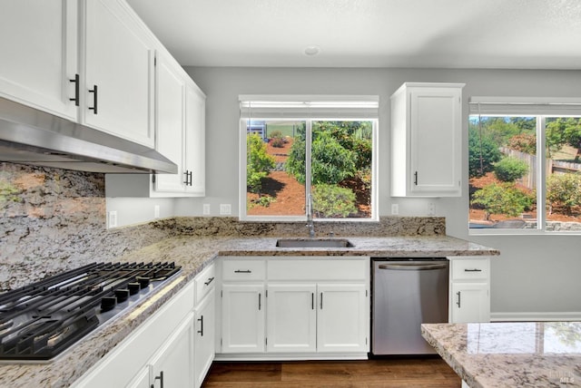 1917 Rollingwood Dr, Fairfield, CA 94534 - kitchen with stainless steel appliances, white cabinets, dark wood-type flooring, and light stone counters