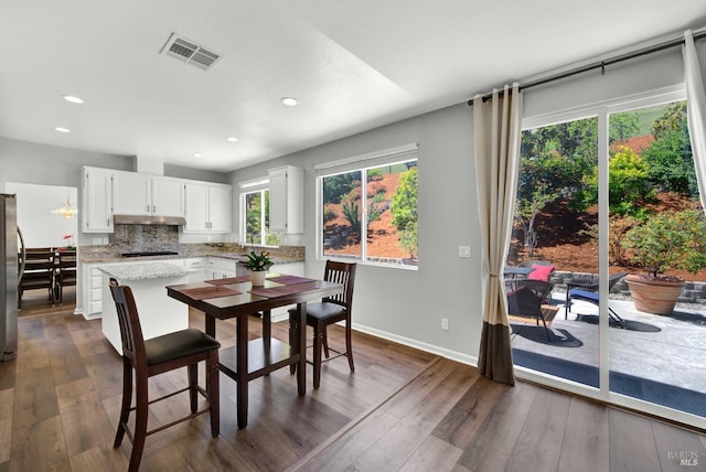 1917 Rollingwood Dr, Fairfield, CA 94534 - dining space featuring healthy amount of natural light, recessed lighting, dark wood-type flooring, and baseboards