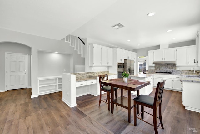 1917 Rollingwood Dr, Fairfield, CA 94534 - kitchen featuring stainless steel appliances, under cabinet range hood, a sink, backsplash, and recessed lighting