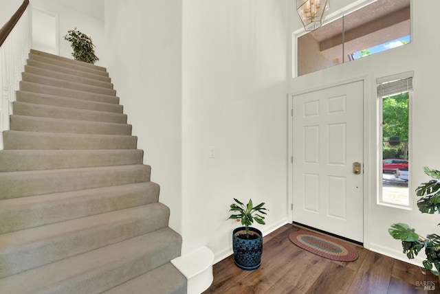 1917 Rollingwood Dr, Fairfield, CA 94534 - entrance foyer with stairs, wood finished floors, baseboards, and a chandelier
