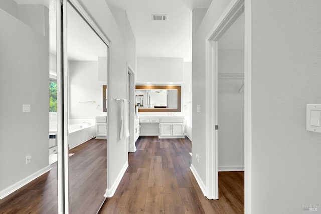 1917 Rollingwood Dr, Fairfield, CA 94534 - hallway with dark wood-style floors and baseboards