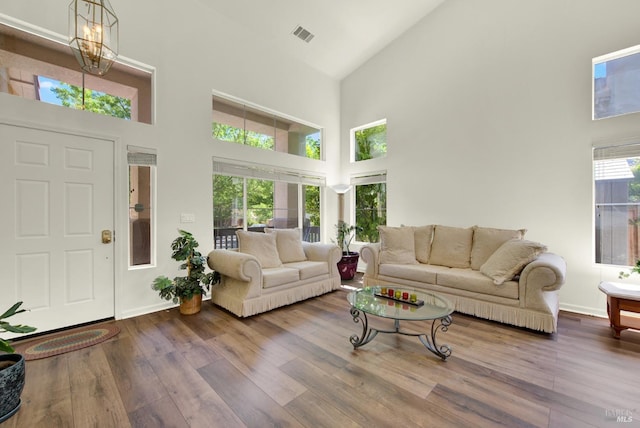 1917 Rollingwood Dr, Fairfield, CA 94534 - living room with high vaulted ceiling, wood finished floors, and baseboards