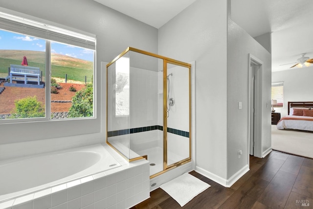1917 Rollingwood Dr, Fairfield, CA 94534 - bathroom featuring ensuite bathroom, wood finished floors, a stall shower, and a ceiling fan