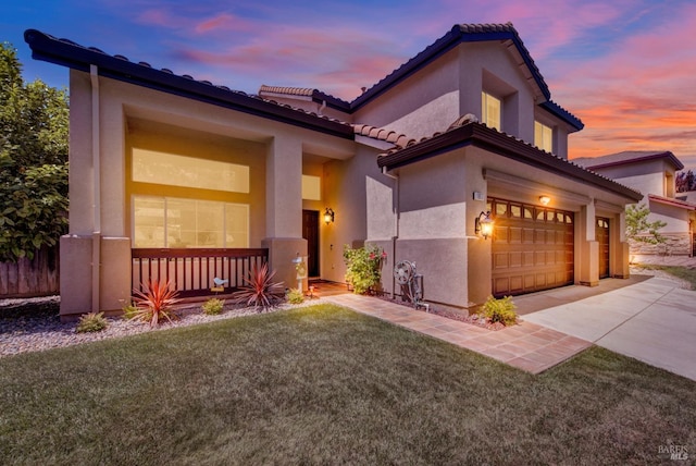 1917 Rollingwood Dr, Fairfield, CA 94534 - mediterranean / spanish house with an attached garage, stucco siding, concrete driveway, a lawn, and a tile roof