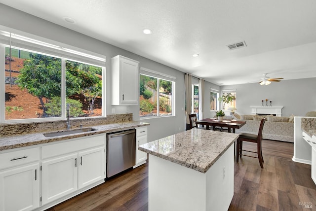 1917 Rollingwood Dr, Fairfield, CA 94534 - kitchen featuring stainless steel dishwasher, a sink, dark wood-style floors, ceiling fan, and recessed lighting