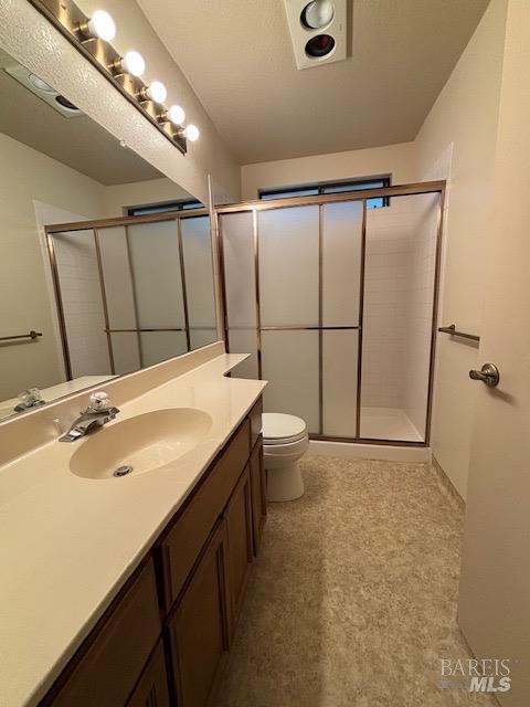 160 Bryce Way, Vacaville, CA 95687 - bathroom featuring toilet, vanity, and a shower stall