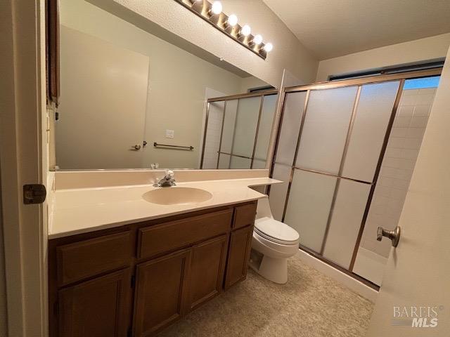 160 Bryce Way, Vacaville, CA 95687 - full bathroom with a shower stall, toilet, and vanity