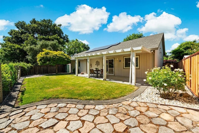 21 Autumn Creek Ct, Napa, CA 94559 - rear view of house with solar panels, a patio area, and board and batten siding