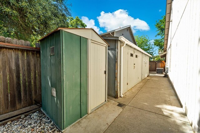 21 Autumn Creek Ct, Napa, CA 94559 - view of shed with a fenced backyard and central AC unit
