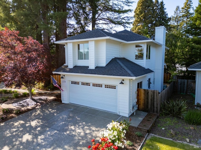 14 Ceriani Ct, Napa, CA 94558 - view of front of house featuring a chimney, a shingled roof, driveway, fence, and an attached garage