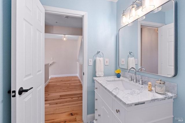 14 Ceriani Ct, Napa, CA 94558 - bathroom with wood finished floors, vanity, and baseboards