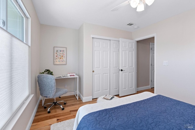 14 Ceriani Ct, Napa, CA 94558 - bedroom with light wood-style floors, ceiling fan, baseboards, and a closet