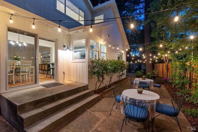 14 Ceriani Ct, Napa, CA 94558 - patio at twilight featuring outdoor dining space and fence