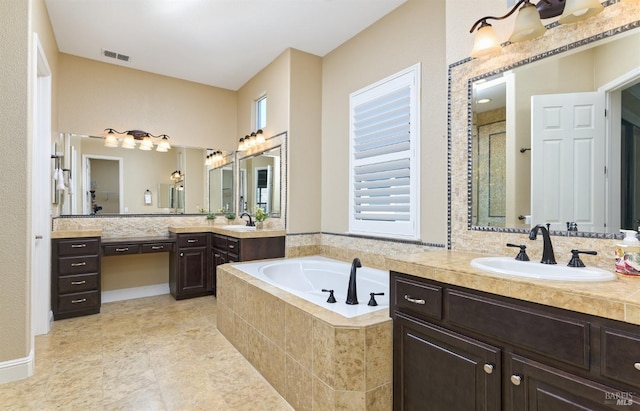 339 Desert Forest Ct, Rio Vista, CA 94571 - bathroom featuring a bath, a stall shower, and two vanities