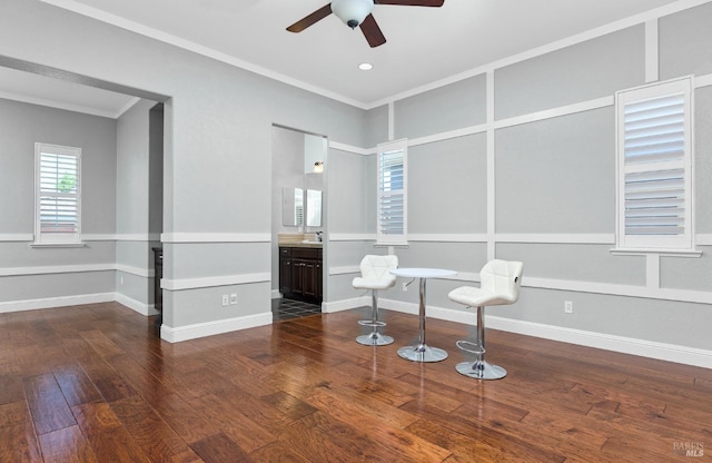 339 Desert Forest Ct, Rio Vista, CA 94571 - empty room with crown molding, a ceiling fan, wood finished floors, baseboards, and a sink