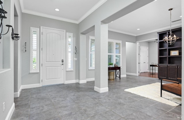 339 Desert Forest Ct, Rio Vista, CA 94571 - entryway with plenty of natural light, crown molding, a chandelier, tile patterned floors, and baseboards