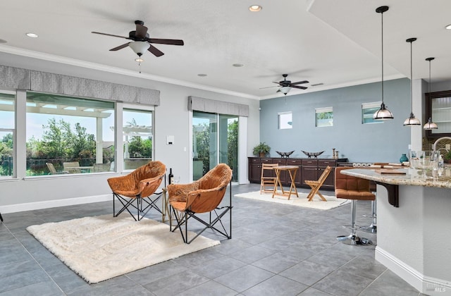 339 Desert Forest Ct, Rio Vista, CA 94571 - living area featuring ceiling fan, ornamental molding, recessed lighting, baseboards, and tile patterned floors