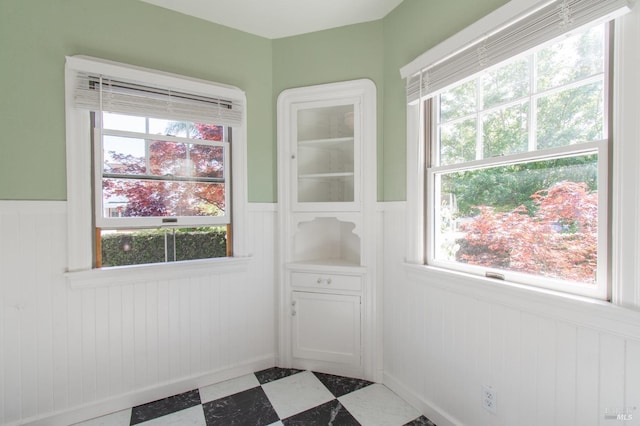 1124 Tuolumne St, Vallejo, CA 94590 - doorway to outside featuring a wainscoted wall, plenty of natural light, and tile patterned floors
