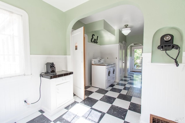 1124 Tuolumne St, Vallejo, CA 94590 - hall featuring arched walkways, light floors, and a wainscoted wall