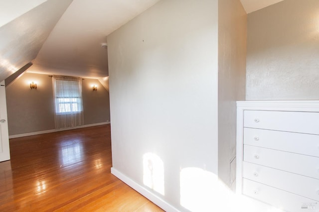 1124 Tuolumne St, Vallejo, CA 94590 - bonus room featuring wood finished floors, vaulted ceiling, and baseboards