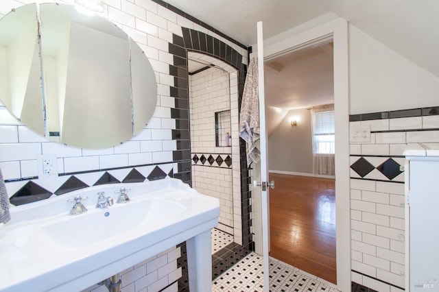 1124 Tuolumne St, Vallejo, CA 94590 - bathroom with tile walls, a sink, and wood finished floors