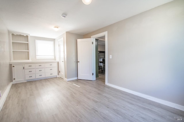 1124 Tuolumne St, Vallejo, CA 94590 - unfurnished bedroom with light wood-style flooring and baseboards