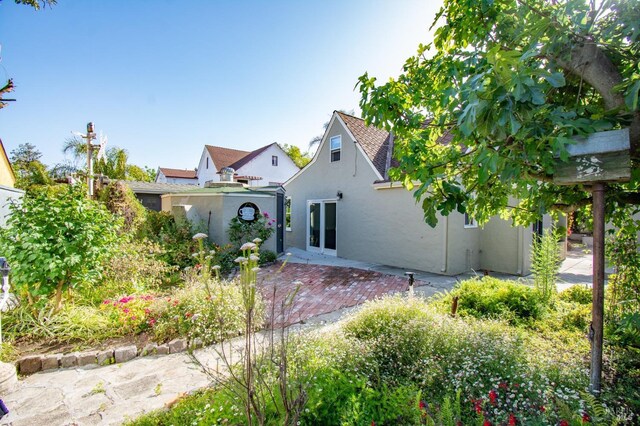 1124 Tuolumne St, Vallejo, CA 94590 - back of house featuring stucco siding and a patio