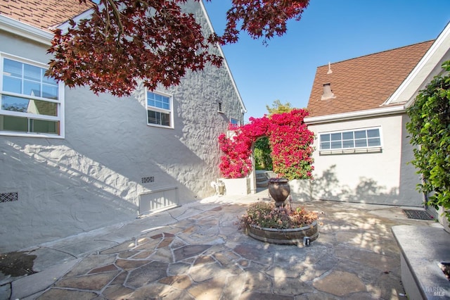 1124 Tuolumne St, Vallejo, CA 94590 - view of home's exterior featuring stucco siding and a patio
