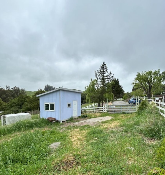 2499 Eastman Ln, Petaluma, CA 94952 - view of yard featuring fence and an outdoor structure