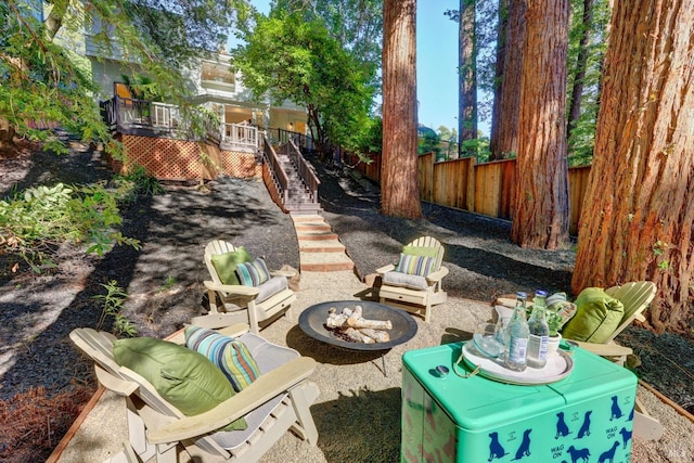 239 W Blithedale Ave, Mill Valley, CA 94941 - view of patio / terrace featuring stairway and an outdoor living space with a fire pit