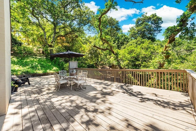 286 Monte Vista Dr, Napa, CA 94559 - wooden terrace featuring outdoor dining space and view of wooded area