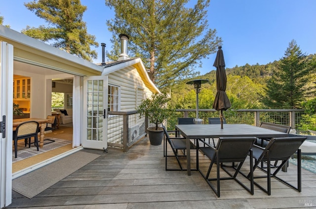 17 Oak Rd, Larkspur, CA 94939 - wooden deck with outdoor dining area and french doors