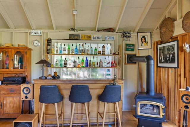17 Oak Rd, Larkspur, CA 94939 - indoor dry bar with wood finished floors, wooden walls, and a wood stove